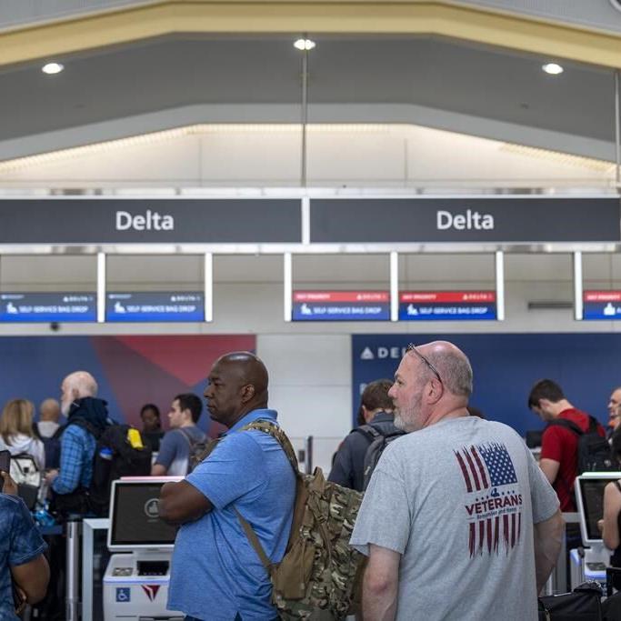 US is investigating Delta's flight cancellations and faltering response to global tech outage
